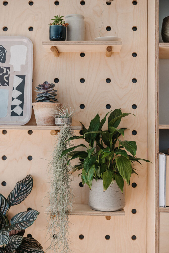 pegboard wall with shelves