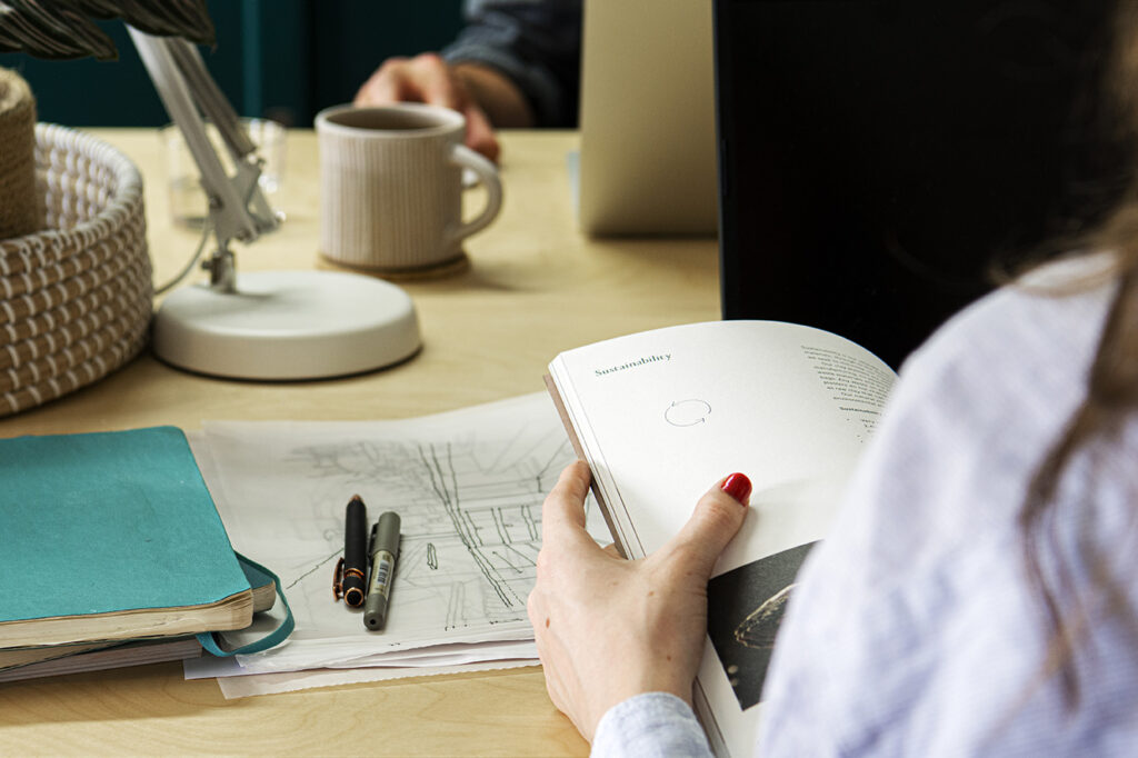 binder and plan on the table